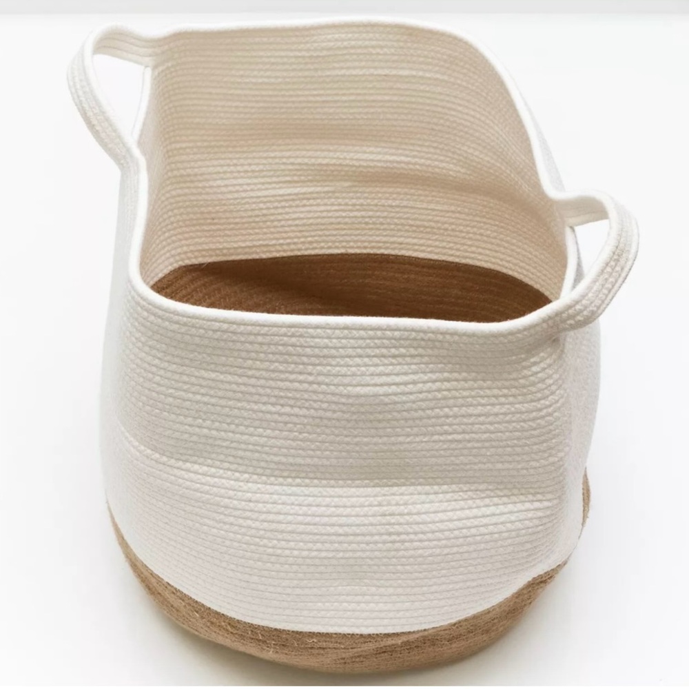 The Folded woven storage Basket with handles by Royal Craft Design
